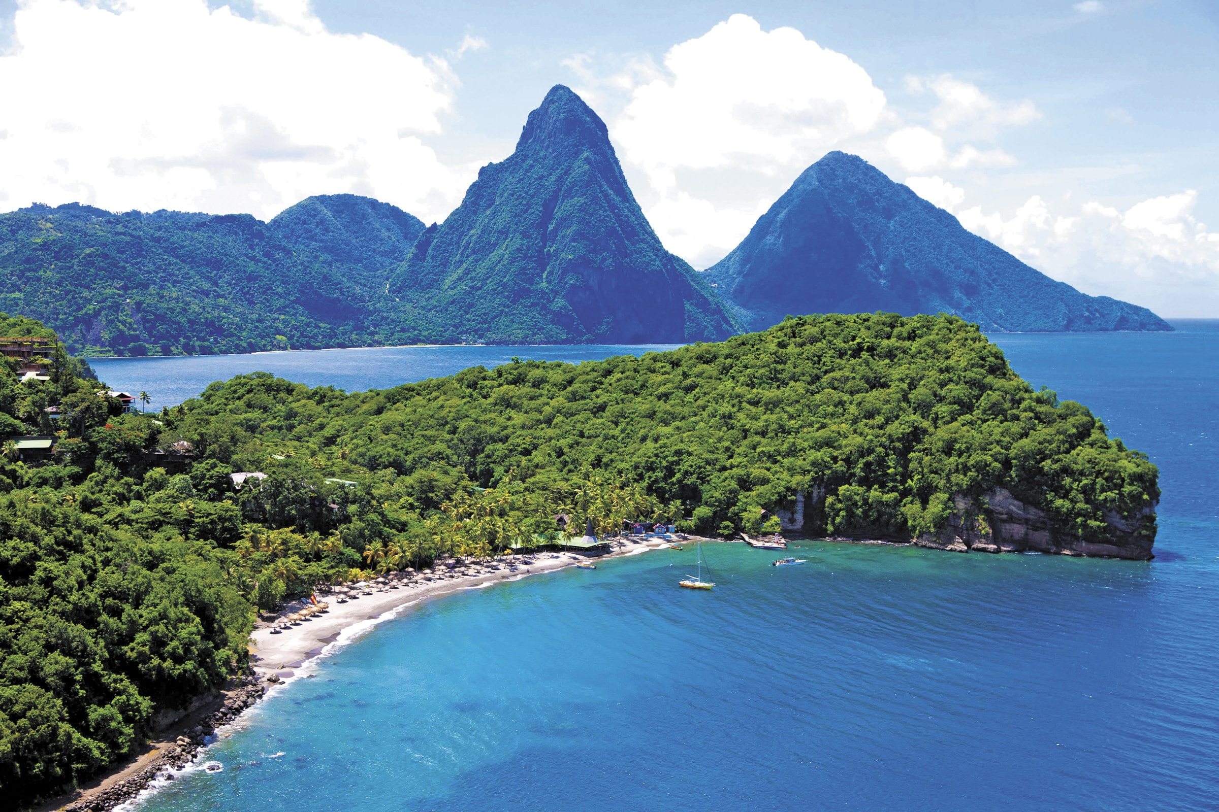With the ionic Pitons in the background and St. Lucia best coral reef out front, it's easy to see why Anse Chastanet is one of the Caribbean's favorite luxury dive resorts.