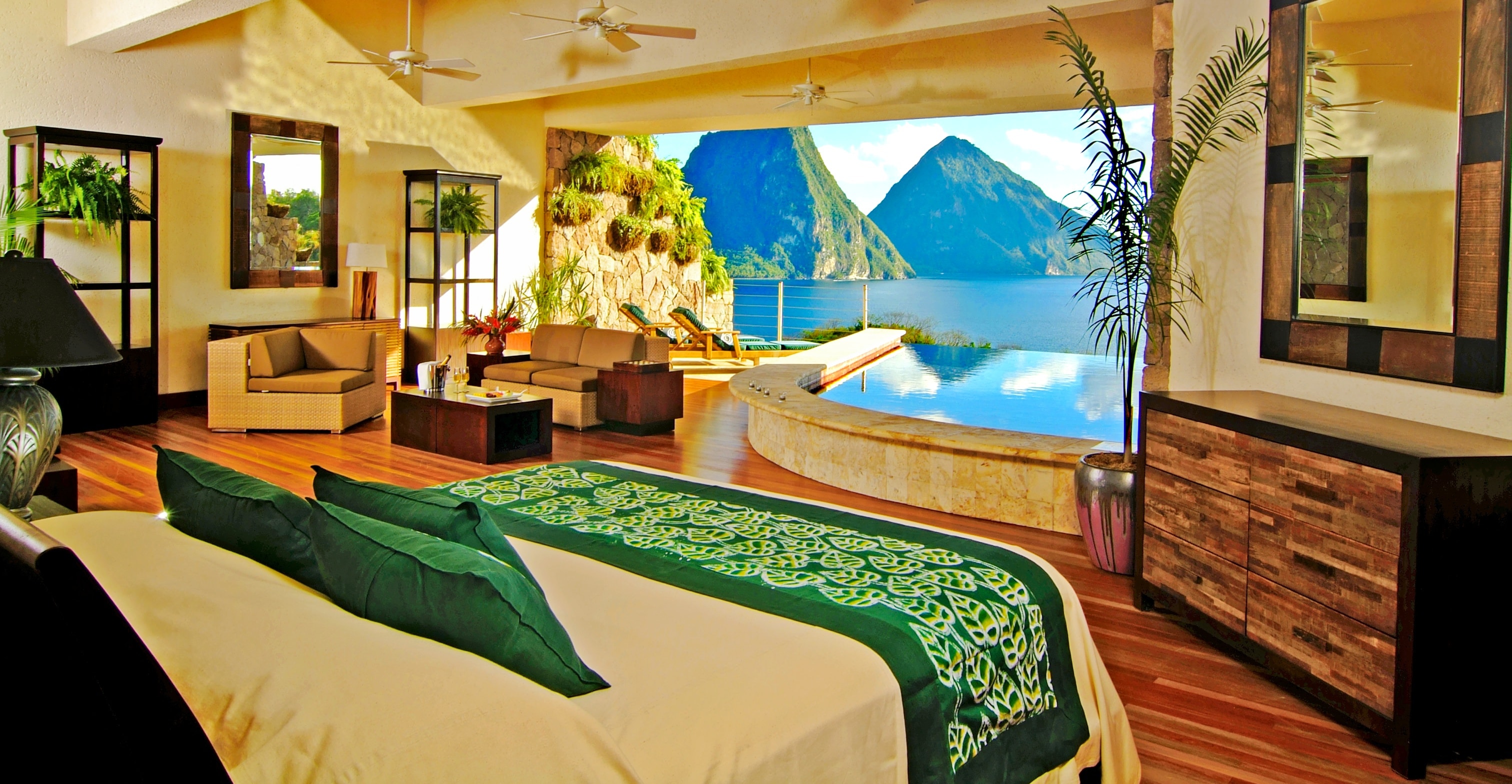 At Jade Mountain, rooms perched high above the Caribbean are left open to usher in amazing views.