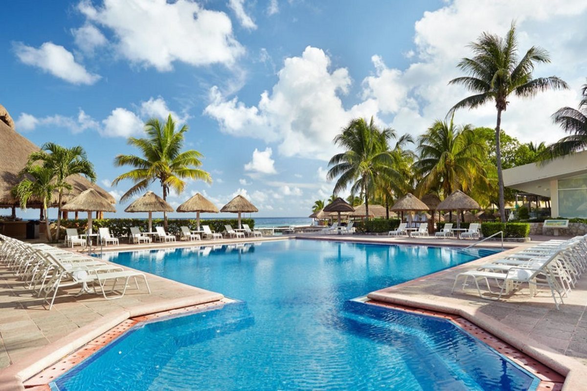 In addition to a half-mile stretch of beach, Cozumel's Presidente resort includes two pools and a beach club.