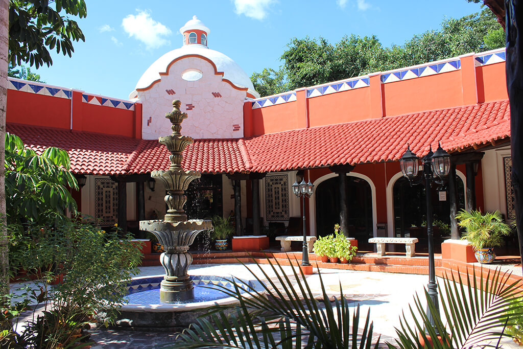 Red tile roofs and traditional hacienda-style architecture set the tone at Occidental Cozumel.
