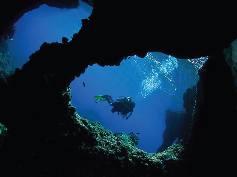 The volcanic northern islands combine clear oceanic waters with intricate volcanic formations.