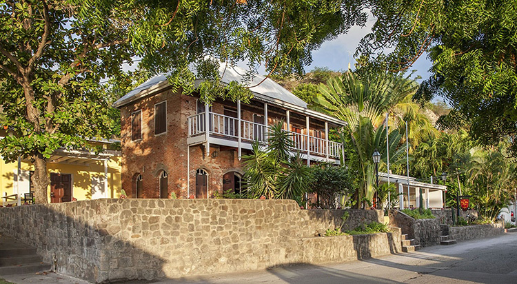 The historic facade of the Old Gin House.
