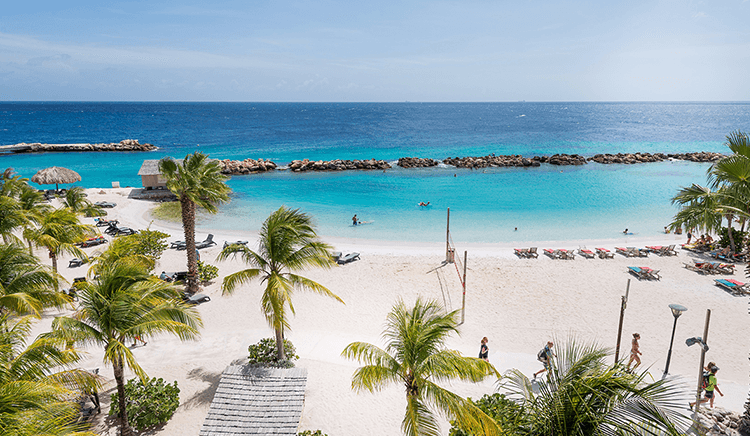 The beach at LionsDive Beach Resort.