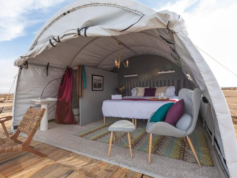 A glamping tent offers the comforts of a hotel room, and it's a lot more fun.