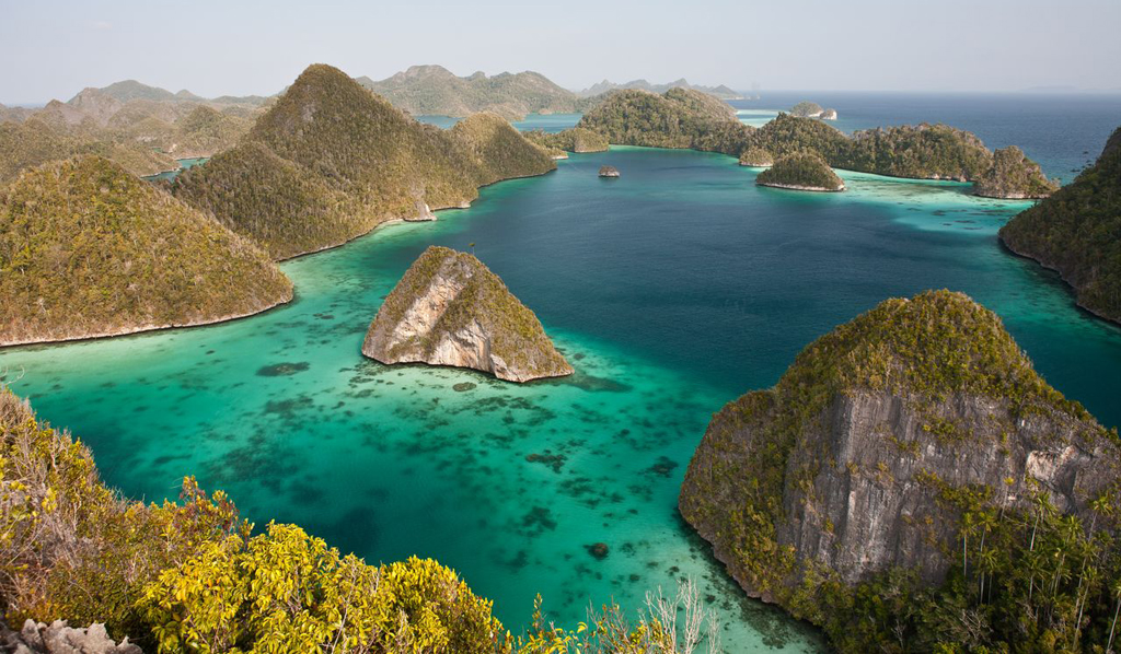 The islands of Raja Ampat combine excellent diving with iconic topside scenery.