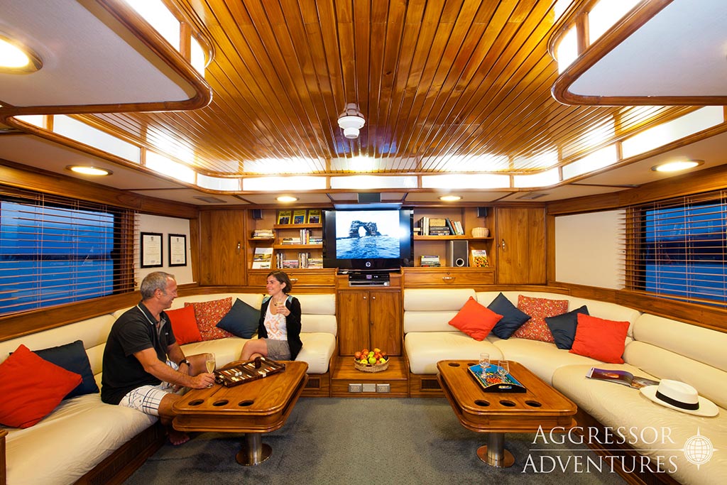 Many liveaboards include comfortable lounge areas that become the center of social activity after a day of diving.