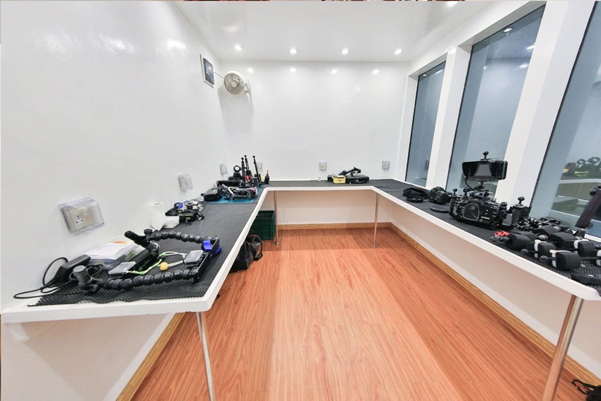 Camera work rooms are uncluttered and spacious and are fitted with numerous charging stations.