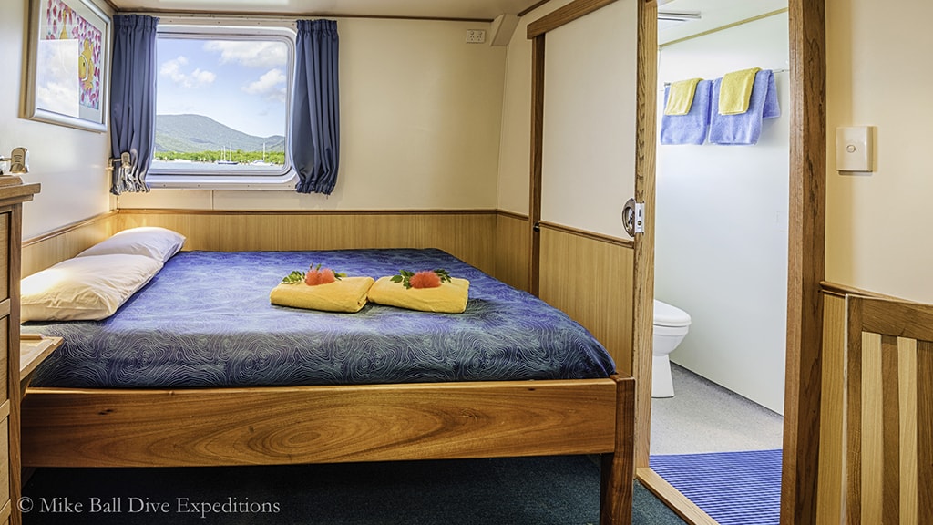 Premium Cabins on the Spoilsport offer queen beds, private baths and large windows.