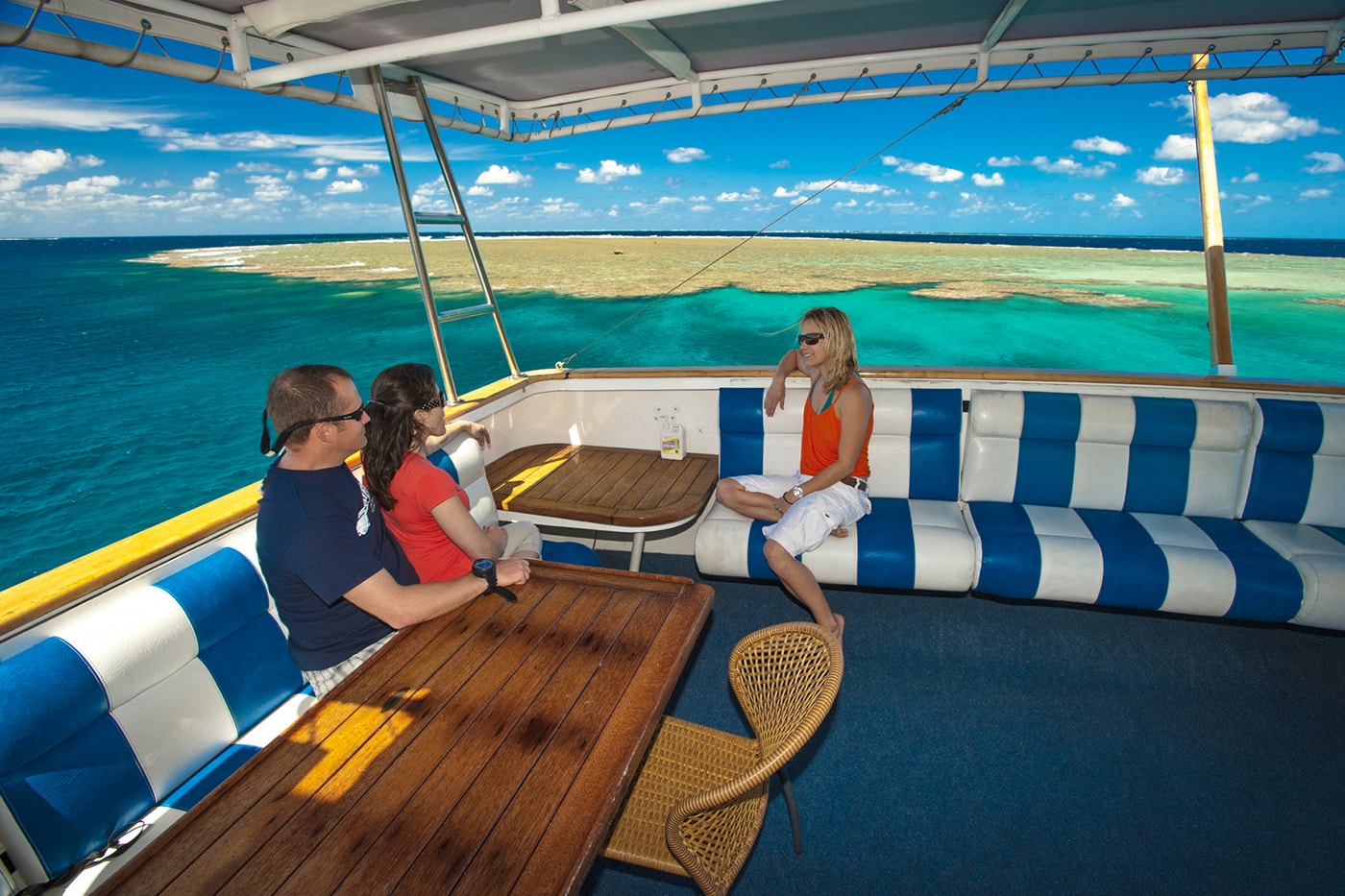 The Spirit of Freedom's top deck includes both open and shaded lounge areas, with great water views.