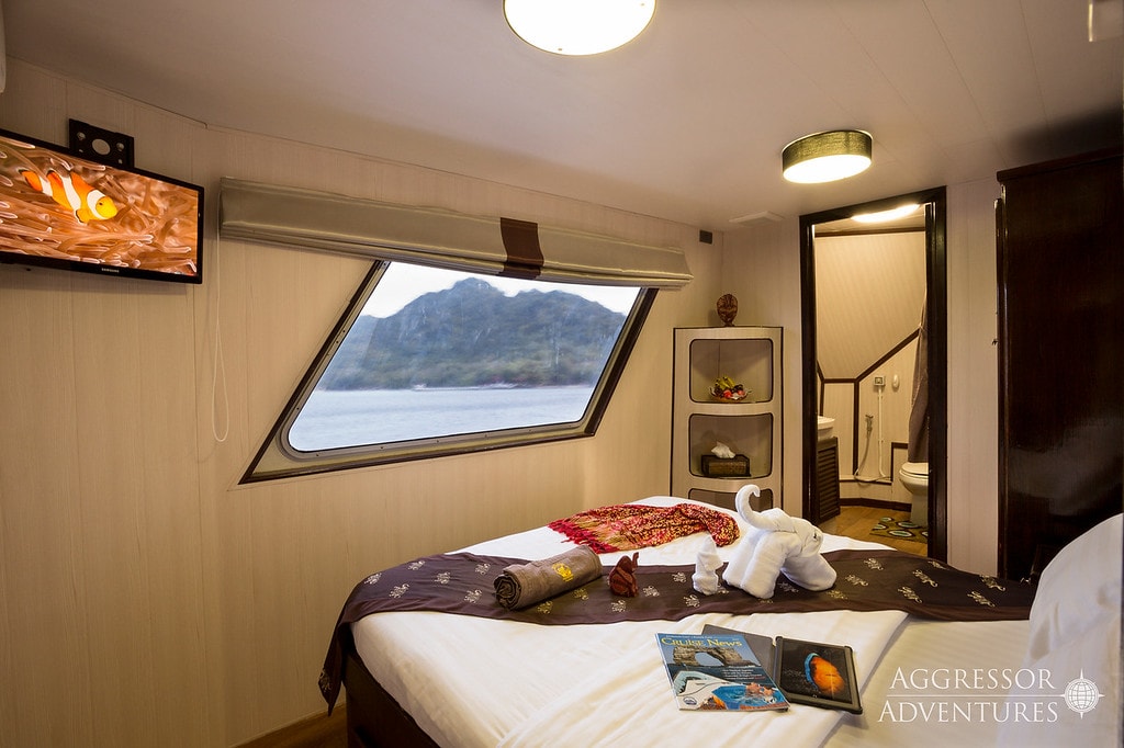 A Master Stateroom on the Thailand Aggressor, with queen berth and private bath.