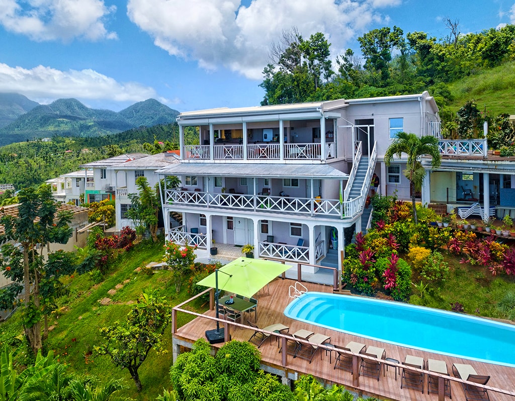 Hotel The Champs is a boutique property set on a hillside overlooking Prince Rupert Bay and the Cabrits National Park.