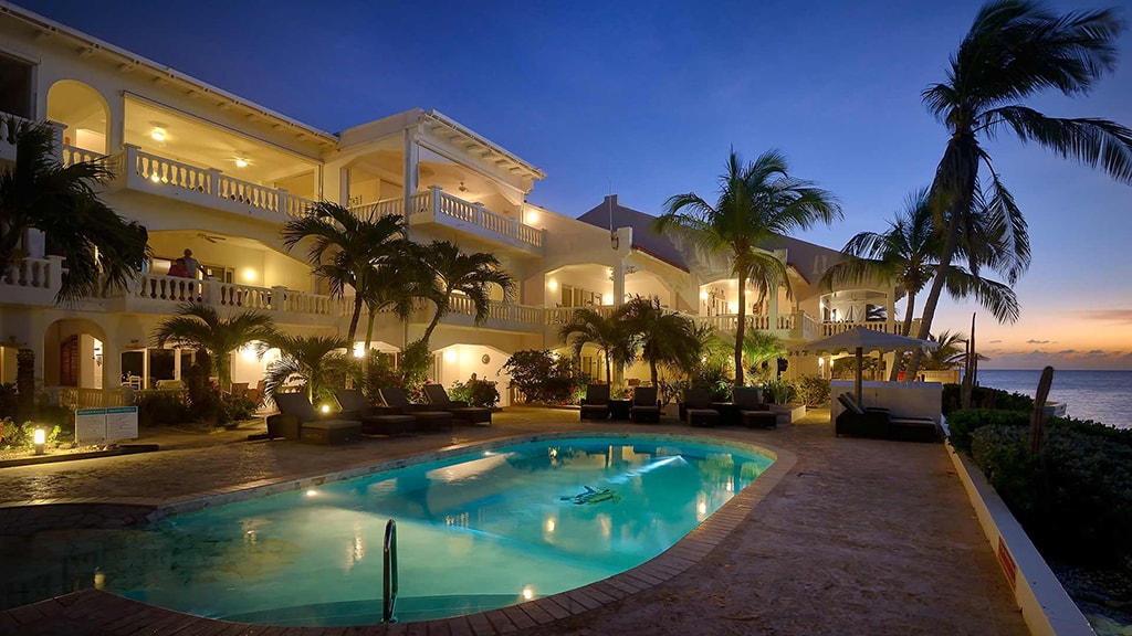 After a day of diving and water sports adventures guests can relax and take in the sunset on Belmar's pool deck.