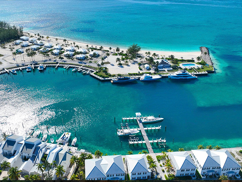 Resort villas cluster around the marina. Bungalows sit on the private beach.