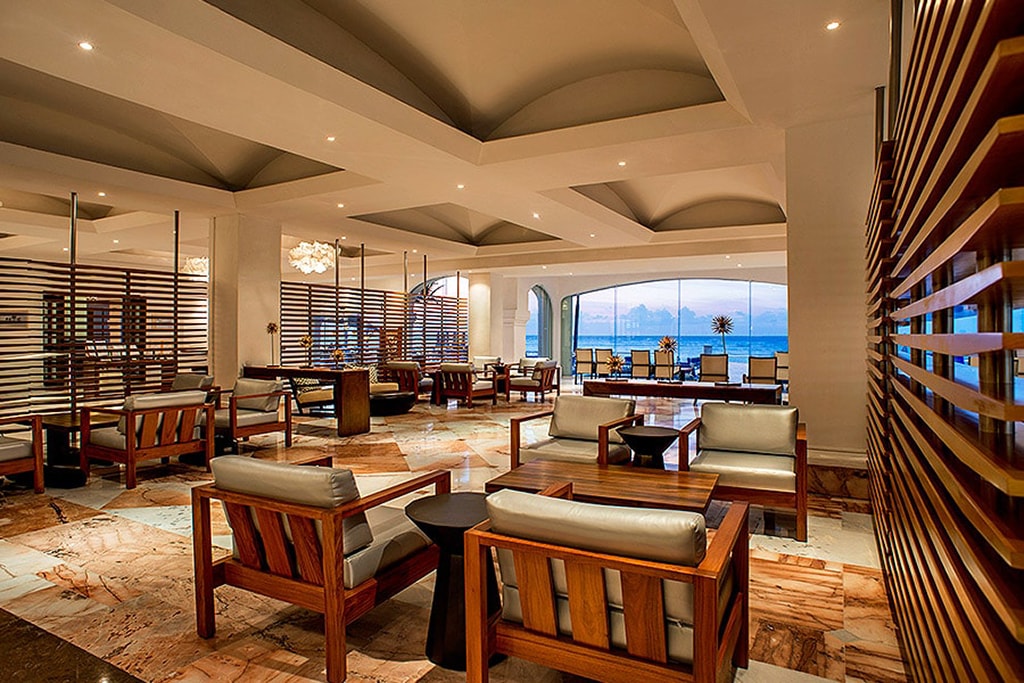The marble-floor lobby of the Cozumel Palace opens to ocean views.