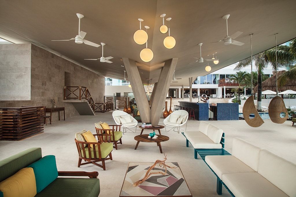 The open-air lobby at Fiesta Americana reflects the mid-century modern design theme that carries throughout the property.