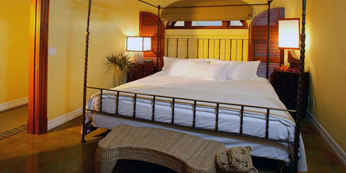 Rooms at Pelican Bay offer bright tropical motifs with eclectic design elements.