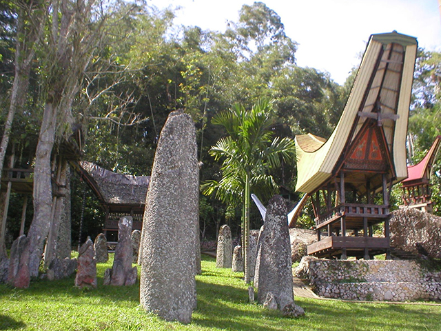 Ceremonial stones in front of a Tongkonan ancestral house.
